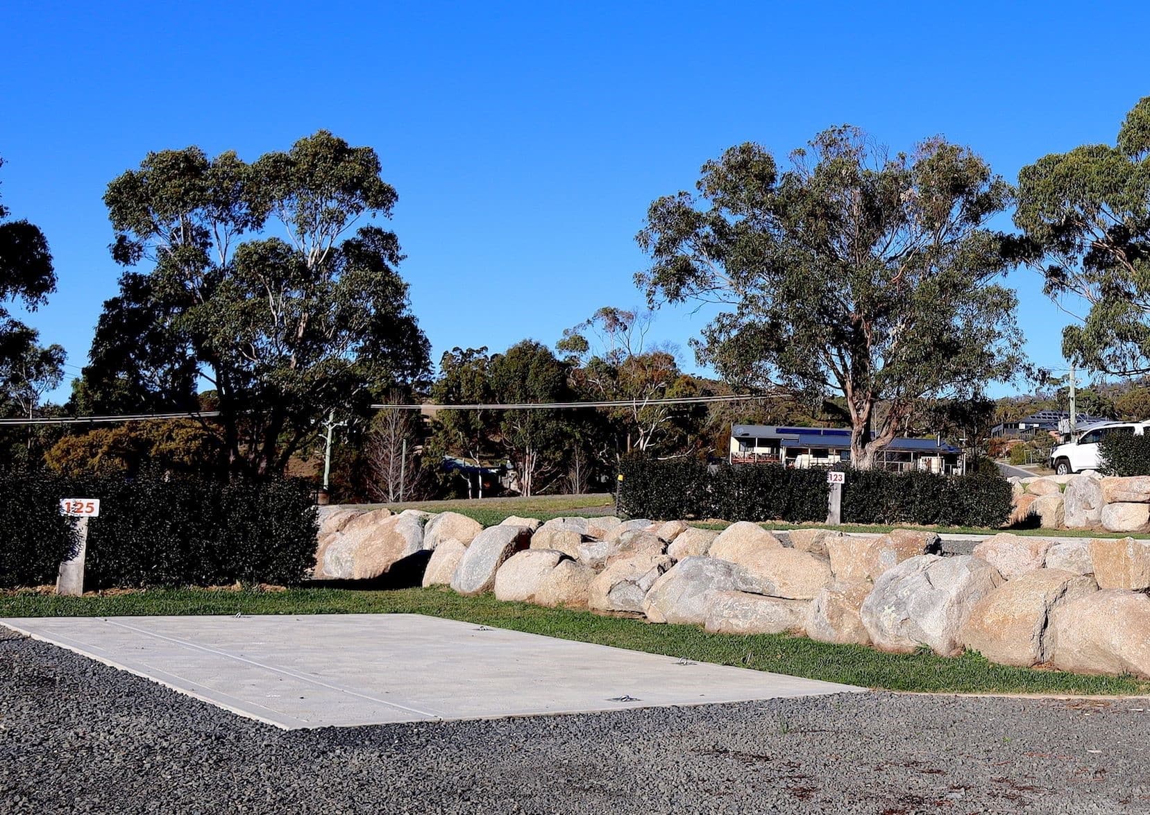 Powered site with concrete pad suitable for vans and campers