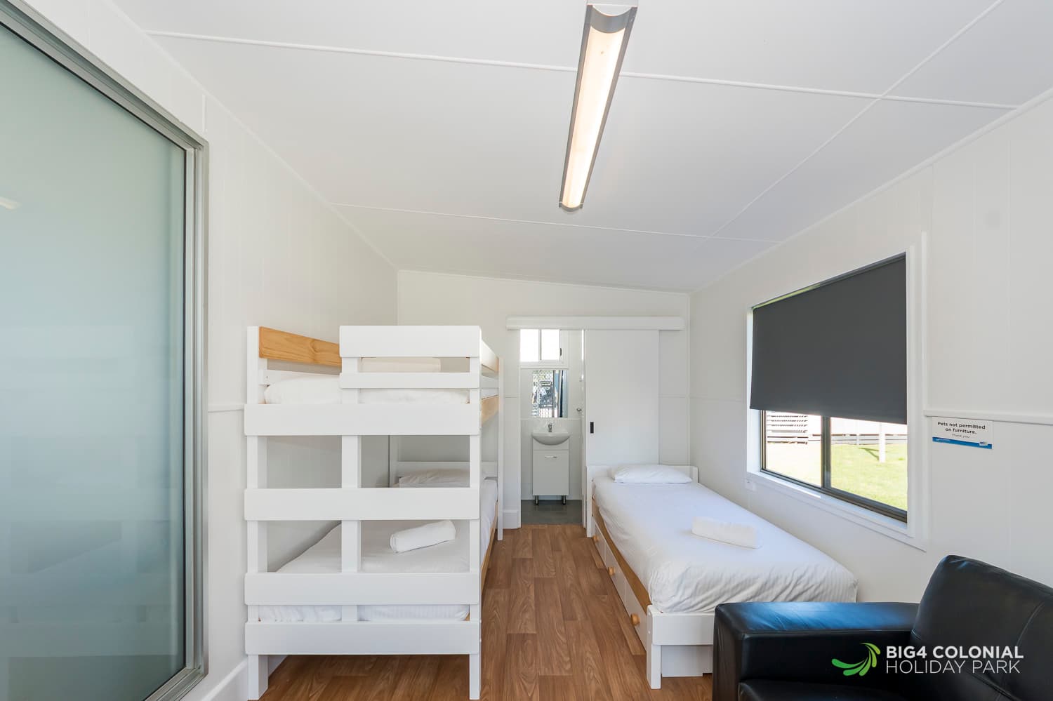 Downstairs bedding and ensuite of two room studios. 