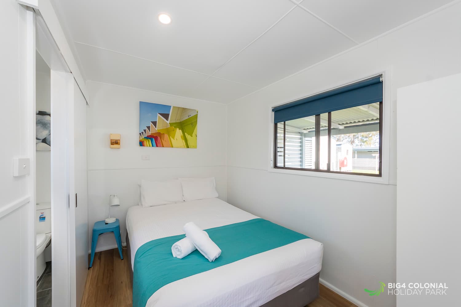 Cozy queen bed in studio cabins. 
