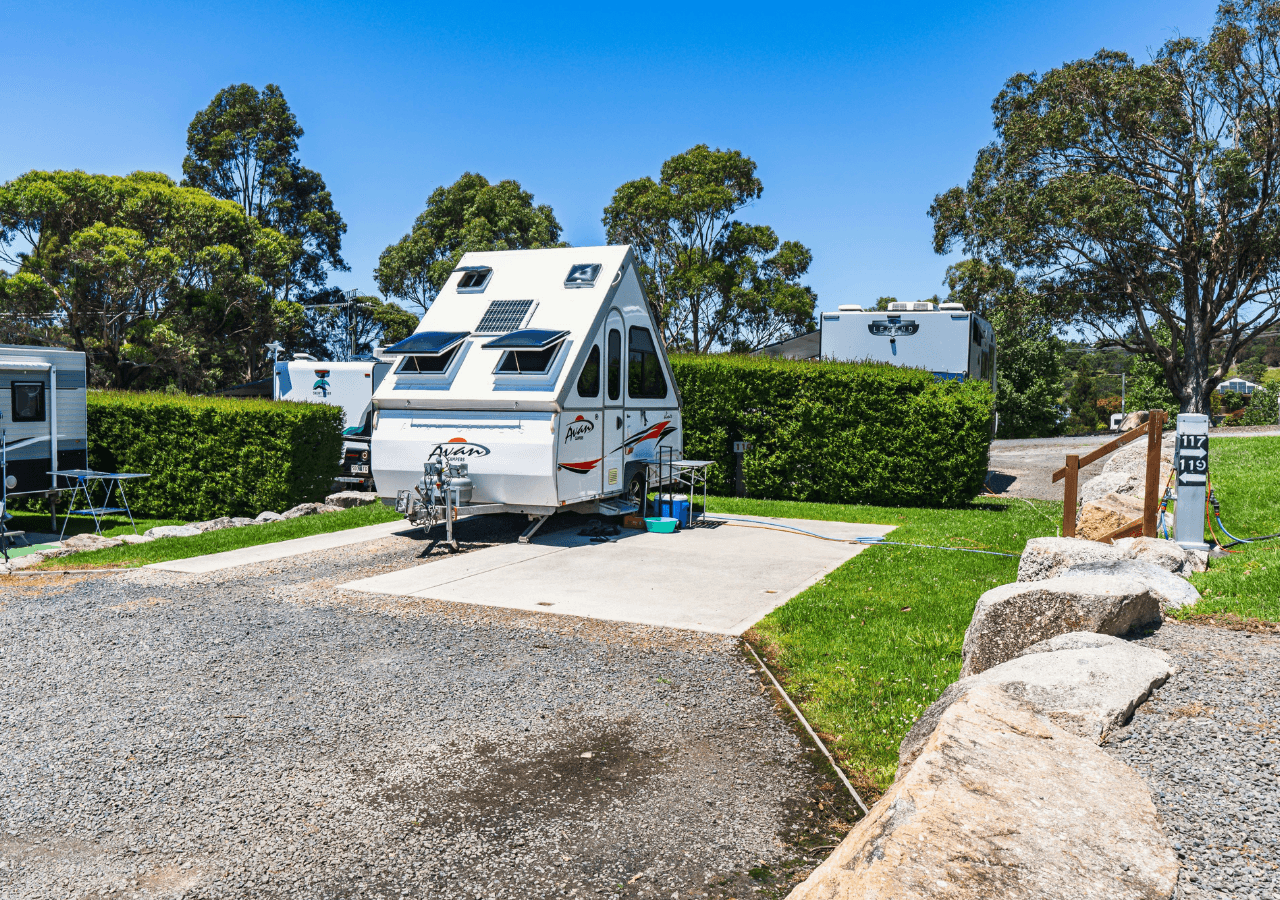 Powered site with concrete pad suitable for vans and campers