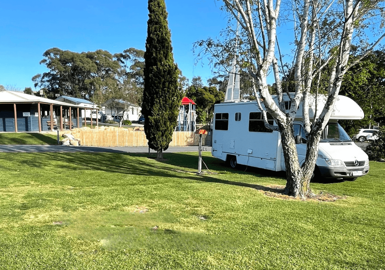 Powered grass sites close to amenities and kids play areas