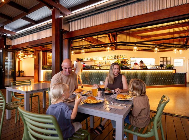 Family enjoying a meal at a restaurant